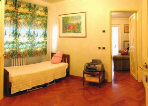 Villa dell Arte : спальня с односпальной кроватью