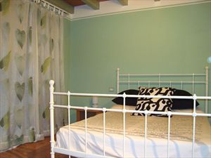 Appartamento Amore : спальня с двуспальной кроватью