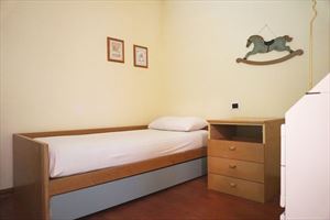 Villa  Amarcord : спальня с односпальной кроватью